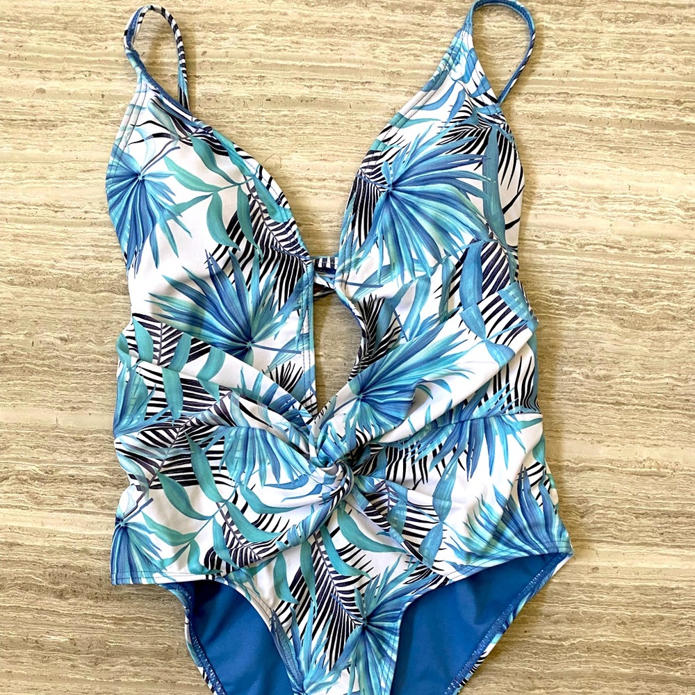 Blue one piece swimsuit.